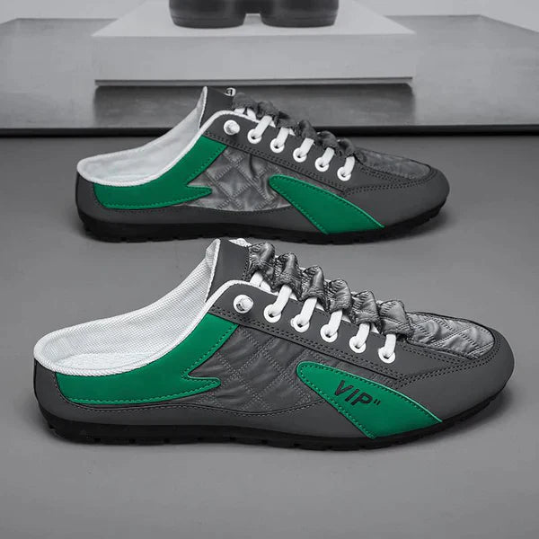 Graue und grüne Herren-Sneaker, Leder, sportlich, lässig, mit Schnürsenkeln.