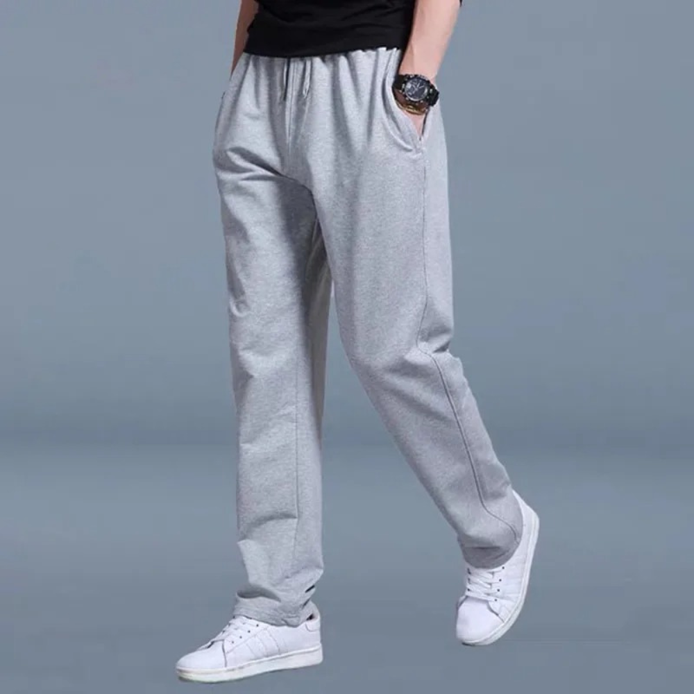 Graue Herren-Jogginghose, bequem, elastischer Bund, Freizeithose, Sportbekleidung.