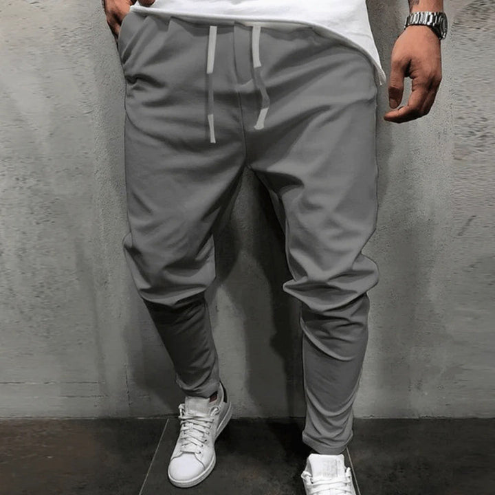 Graue Jogginghose Herren, sportlich, bequem, Baumwolle, mit Kordelzug, lässig, modern.