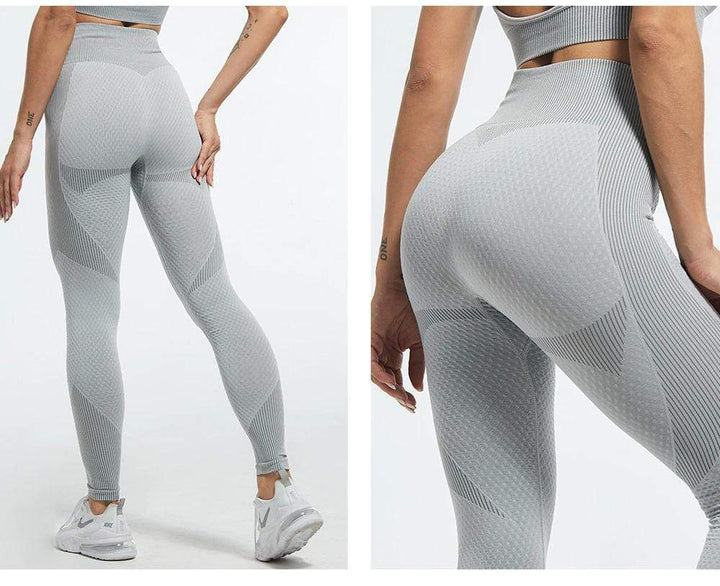 Graue nahtlose Leggings, figurformend, hoher Bund, Sportbekleidung, Damenmode.