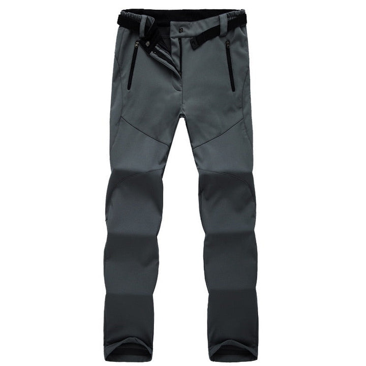 Graue Outdoor-Hose, wasserdicht, mit Reißverschlusstaschen, ideal für Wandern und Trekking.