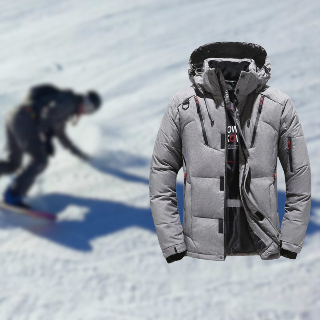 Graue Skijacke mit Kapuze, wasserdicht, warm, ideal für Wintersport und Outdoor-Aktivitäten.