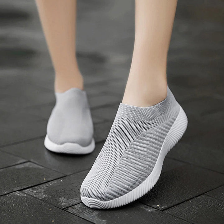 Graue, nahtlose Sneaker für Damen, atmungsaktiv, rutschfest, ideal für Sport und Freizeit.