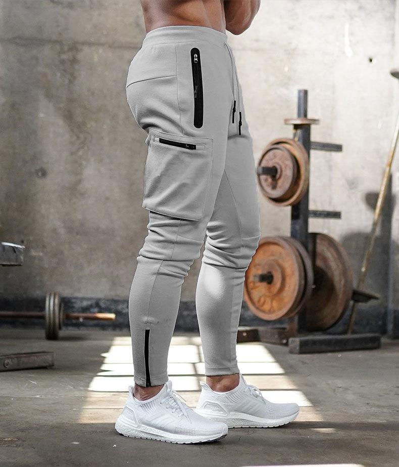 Graue Jogginghose mit Reißverschlusstaschen, Fitnessstudio, Herrenmode, Sportbekleidung, bequem