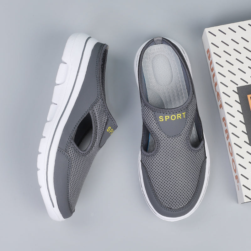 Graue Sportschuhe aus Mesh mit weißer Sohle, atmungsaktiv, rutschfest, für Herren.