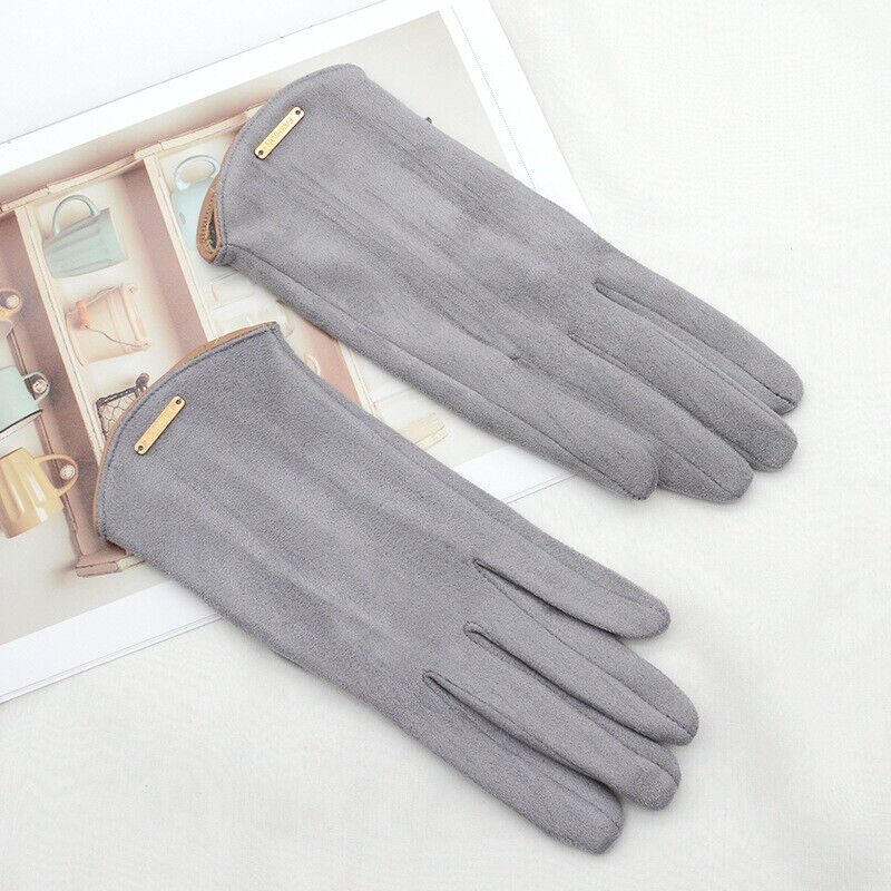 Graue Wildlederhandschuhe, elegant, Damenmode, Herbstaccessoire, stilvoll, warm, hochwertig.