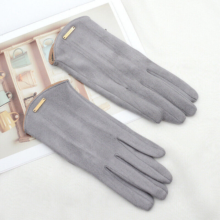 Graue Wildlederhandschuhe, elegant, Damenmode, Herbstaccessoire, stilvoll, warm, hochwertig.