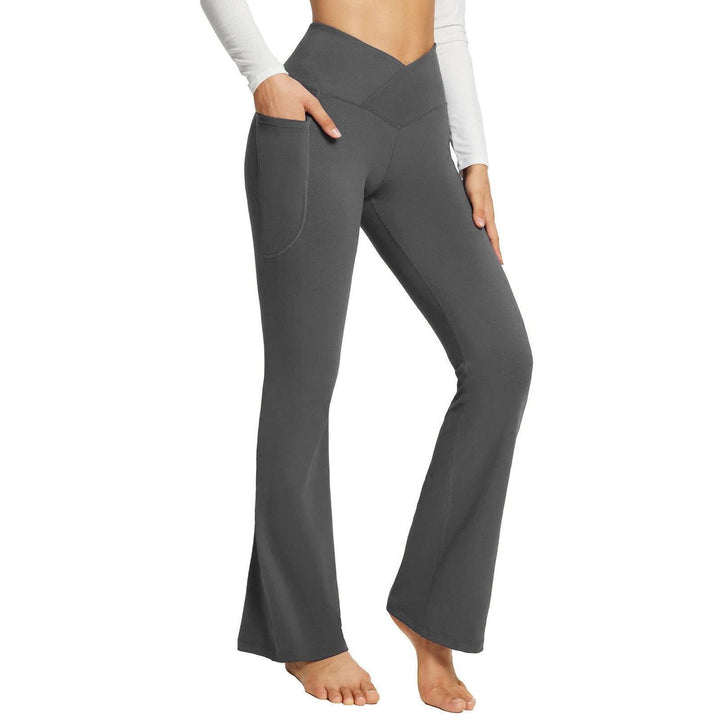 Graue Damen-Yoga-Hose mit Taschen, Bootcut-Stil, elastisch, bequem, Sportbekleidung.