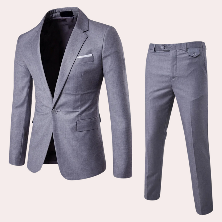 Grauer Herrenanzug, zweiteilig, Sakko und Hose, elegantes Design, Businessmode.
