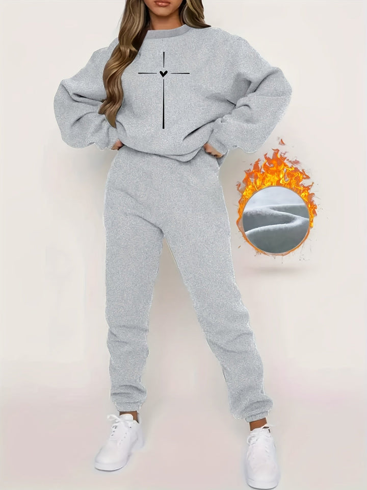 Grauer Damen-Sweatanzug mit Kreuzmotiv, bequemer Freizeitlook, modisch und warm.