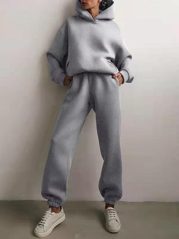 Grauer Damen-Hoodie und Jogginghose Set, bequem, lässig, Freizeitkleidung, Sportanzug.