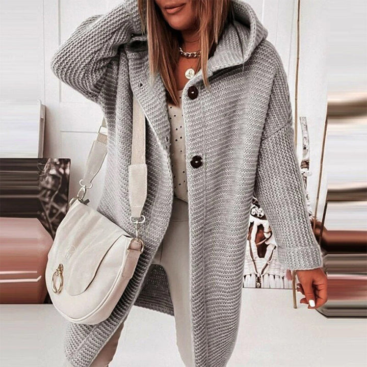 Damen Strickjacke grau, Kapuze, Knöpfe, lässig, Herbstmode, Strickmantel, modisch, bequem.