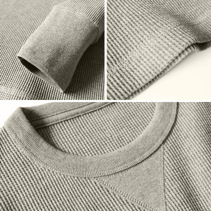 Grauer Strickpullover aus Baumwolle, Nahaufnahme, Texturdetails, modisch, bequem, langlebig.