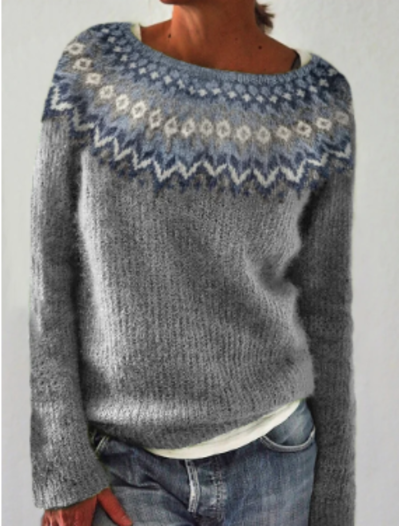 Grauer Strickpullover mit blau-weißem Norwegermuster, Damenmode, Winterkleidung.