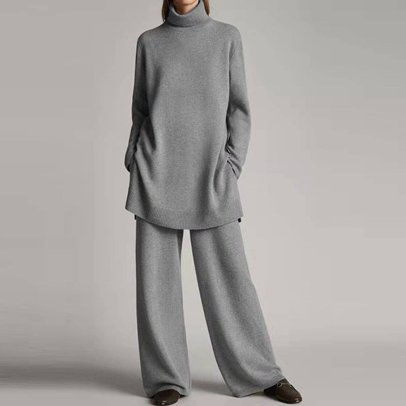 Grauer Damen-Strickpullover und Hose Set, gemütlich, modisch, Herbst-Winter-Outfit.