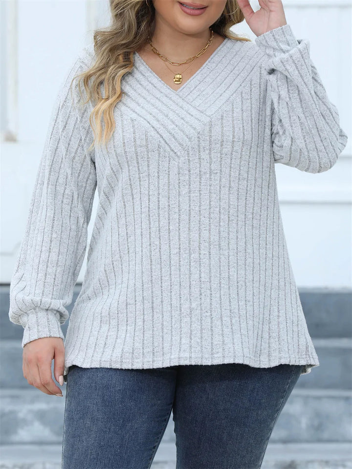 Damen Pullover grau, V-Ausschnitt, Strick, langärmelig, lässig, Herbstmode, bequem.