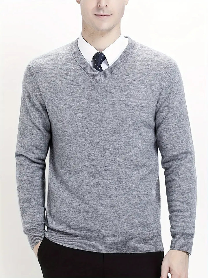 Grauer Herrenpullover aus Wolle, V-Ausschnitt, elegant, warm, modisch, für Büro und Freizeit.