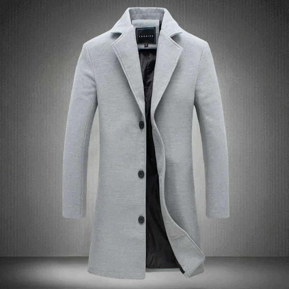 Grauer Herrenmantel aus Wolle, elegant, knielang, mit Knöpfen, für Wintermode.