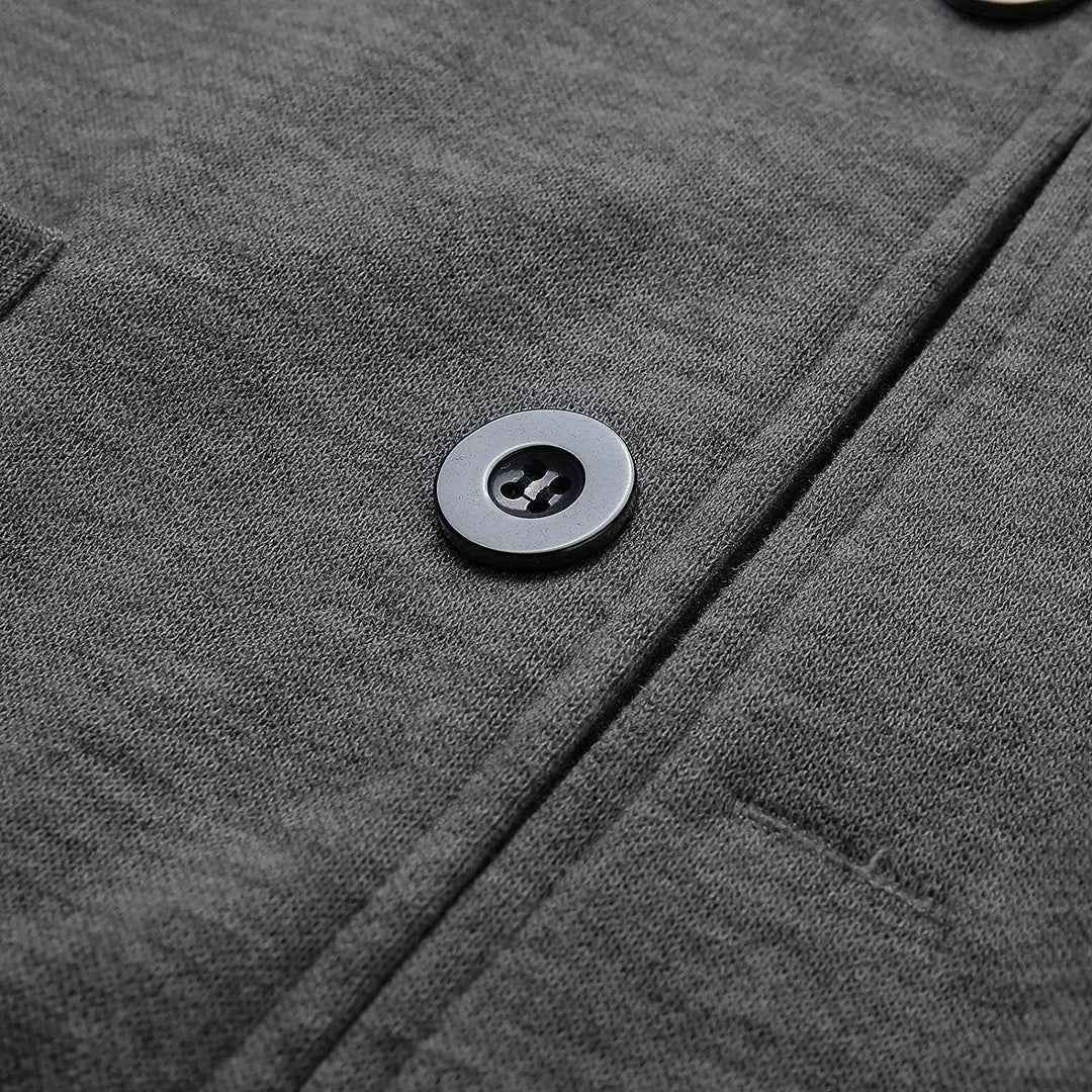 Grauer Wollmantel mit Knopfdetail, elegantes Design, hochwertige Verarbeitung, Herbstmode.