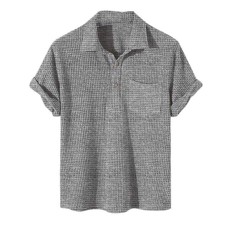 Graues Herren-Poloshirt aus Baumwolle, kurzärmelig, geripptes Design, Freizeitmode.
