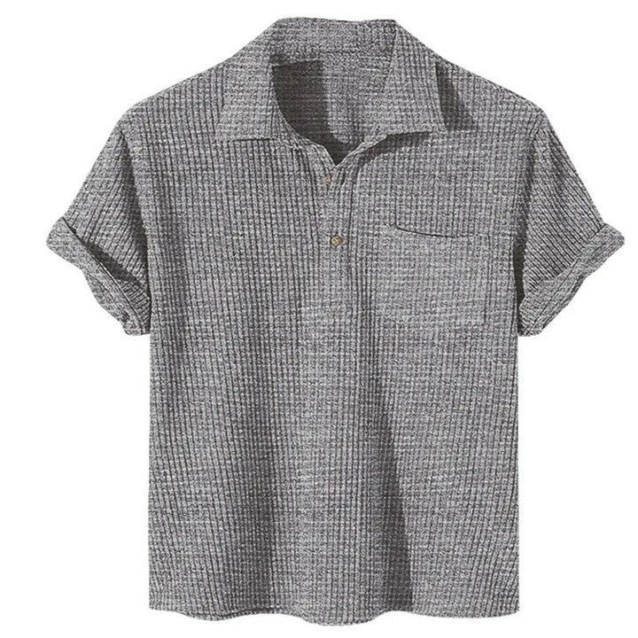 Graues Herren-Poloshirt aus Baumwolle, kurzärmelig, geripptes Design, klassischer Kragen.