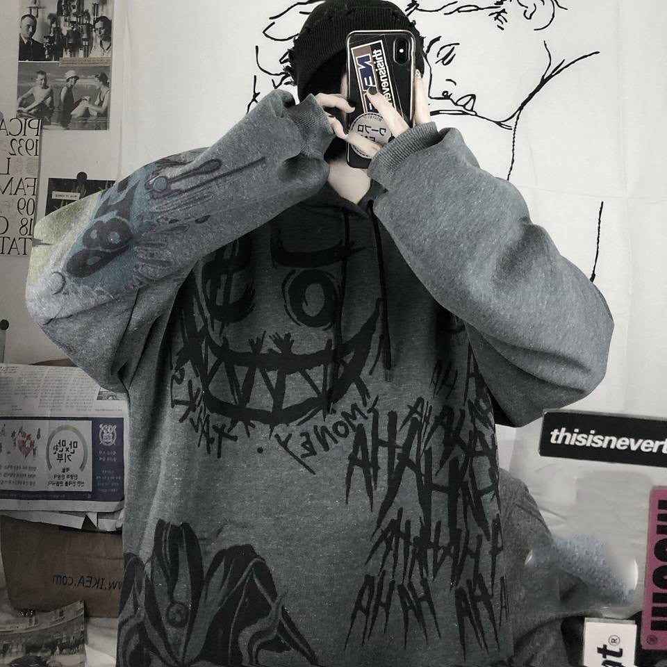Grauer Oversize-Pullover mit schwarzem Graffiti-Design, Unisex Streetwear, Baumwolle.