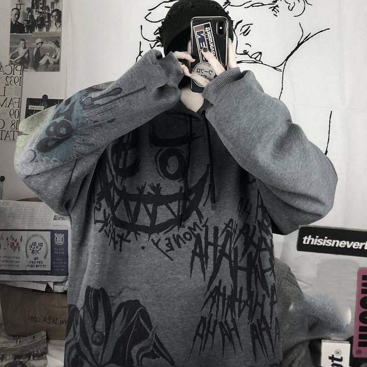 Grauer Oversize-Pullover mit schwarzem Graffiti-Design, Unisex Streetwear, Baumwolle.