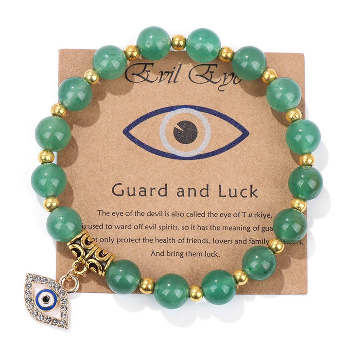 Grünes Aventurin-Armband mit goldenen Perlen und Nazar-Anhänger für Schutz und Glück.