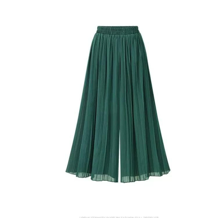 Grüne plissierte Damenhose, weit geschnitten, aus leichtem Stoff, modisch und elegant.