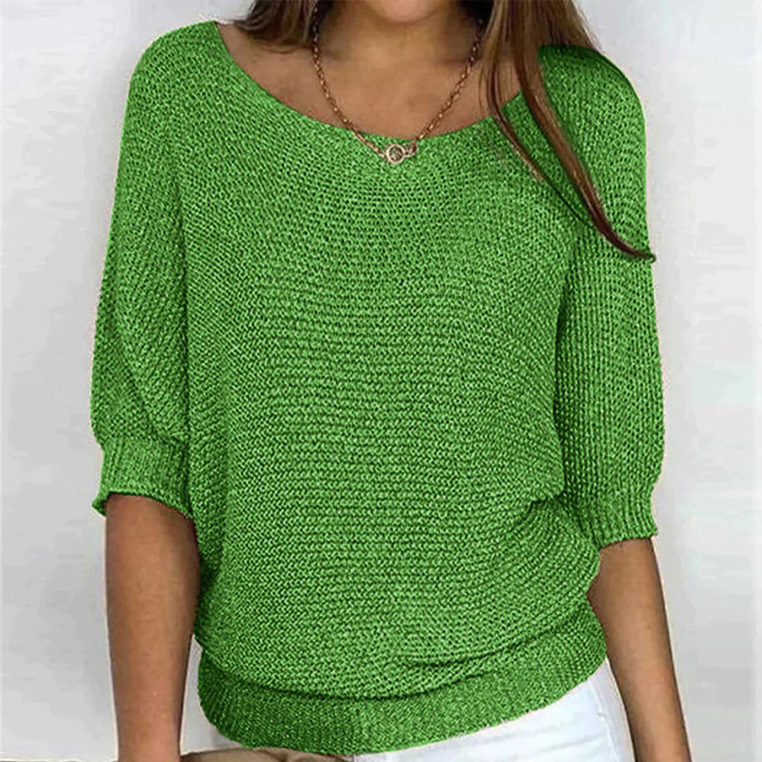 Frau in grünem Strickpullover, lässig, modisch, Damenmode, Frühlingsoutfit, Freizeitkleidung.