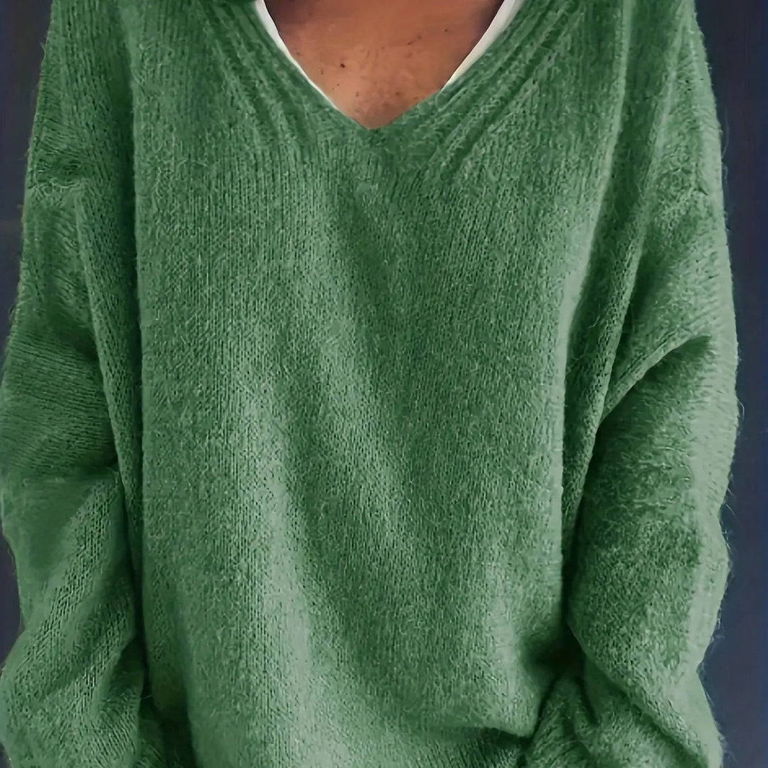Grüner Damenpullover aus Strick, V-Ausschnitt, weiches Material, modisch, bequem.