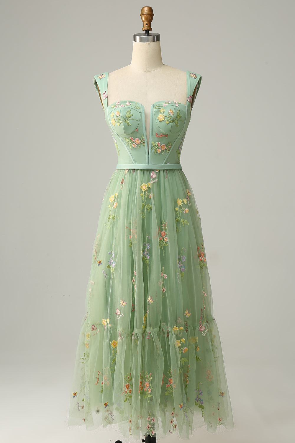 Grünes Abendkleid mit Blumenstickerei, ärmellos, Tüll, elegantes Design, Damenmode.