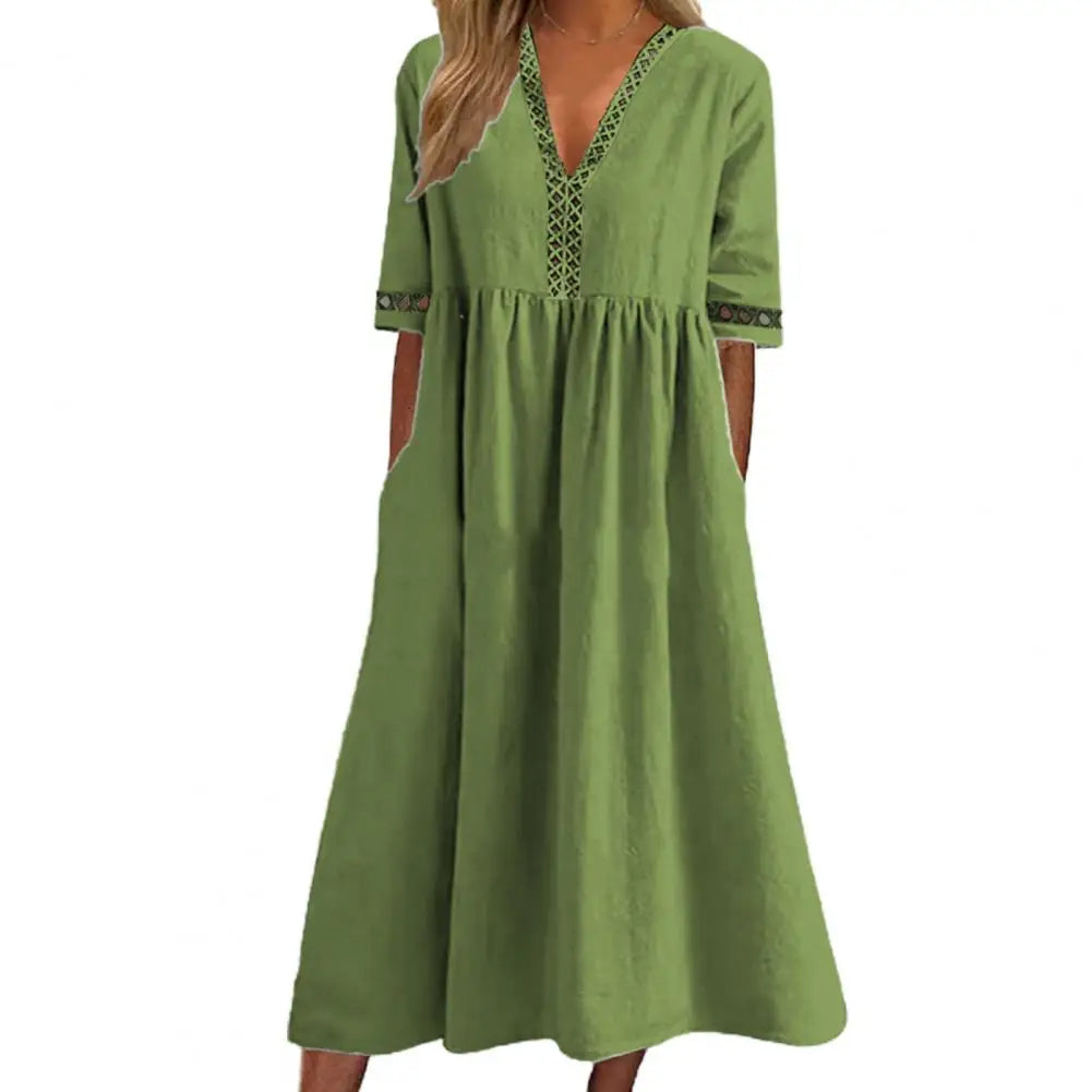Grünes Damenkleid mit V-Ausschnitt, 3/4-Ärmeln und Taschen, lässig, Baumwolle.