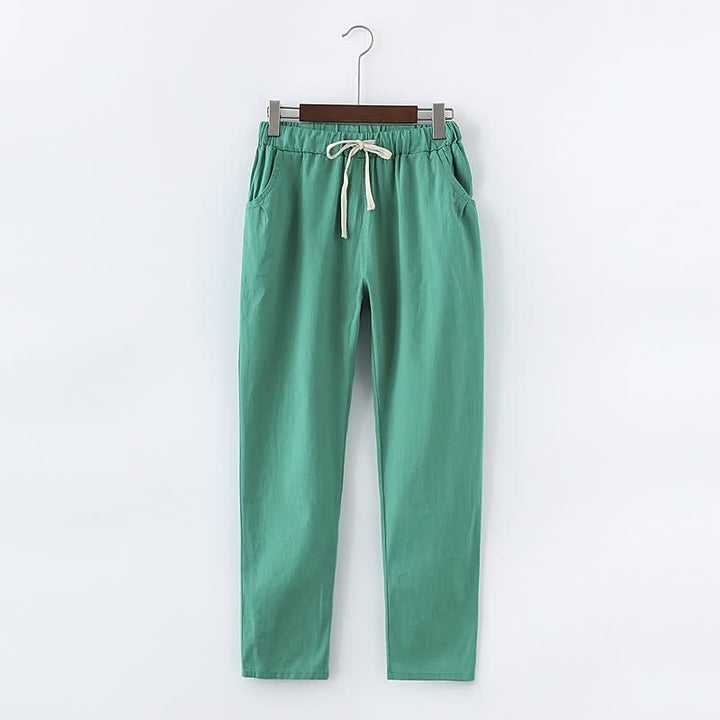 Grüne Baumwollhose mit Kordelzug, lässige Passform, ideal für Freizeitkleidung.