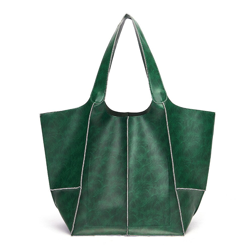 Grüne Ledertasche, große Einkaufstasche, modisches Accessoire, umweltfreundlich, Damenmode.