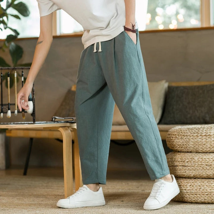 Grüne Leinenhose für Herren, lässig, bequem, mit Kordelzug, ideal für Sommermode.