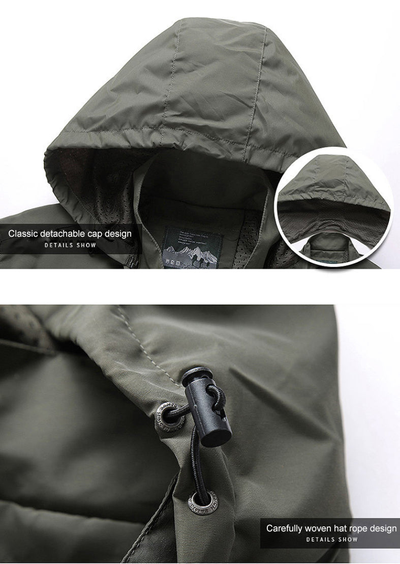 Grüne Outdoor-Jacke mit abnehmbarer Kapuze, strapazierfähigem Material, Kordelzug-Design.