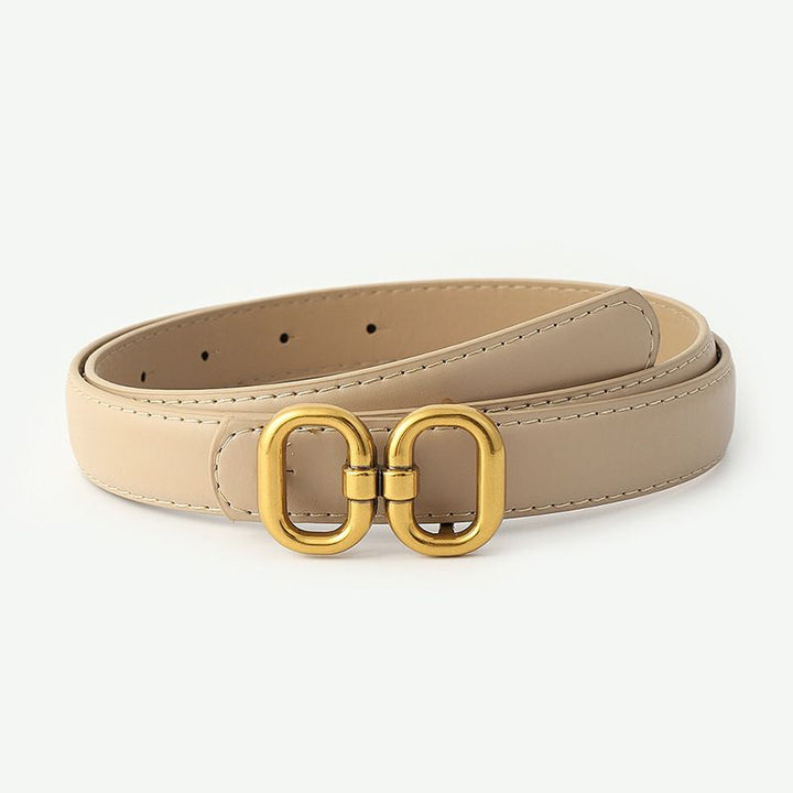 Beiger Ledergürtel mit goldener Schnalle, modisches Accessoire für Damen.
