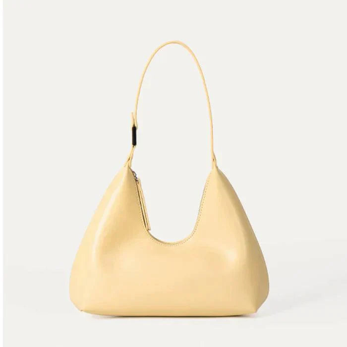 Gelbe Halbmondtasche aus Leder, tragbar, modisch, Damenhandtasche, elegantes Design.