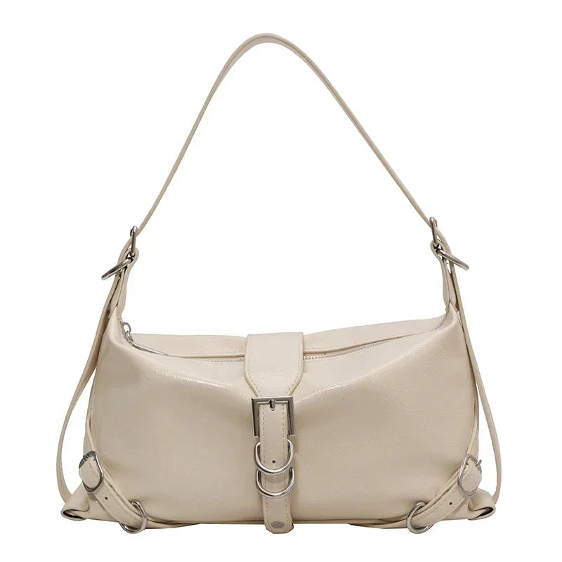 Beige Lederhandtasche mit Schnalle, modisches Accessoire für Damen, elegantes Design.