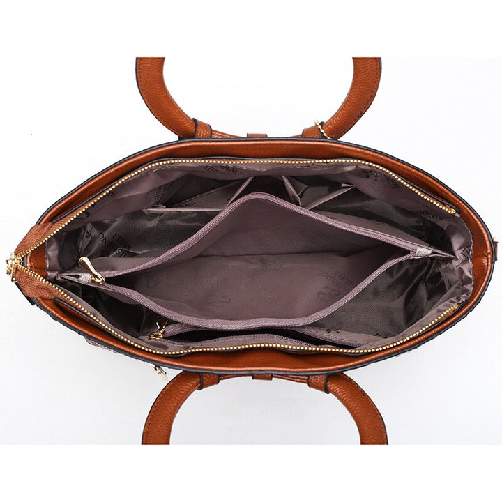 Braune Ledertasche mit Reißverschluss, Innenfächer, elegante Damenhandtasche, stilvoll, praktisch.