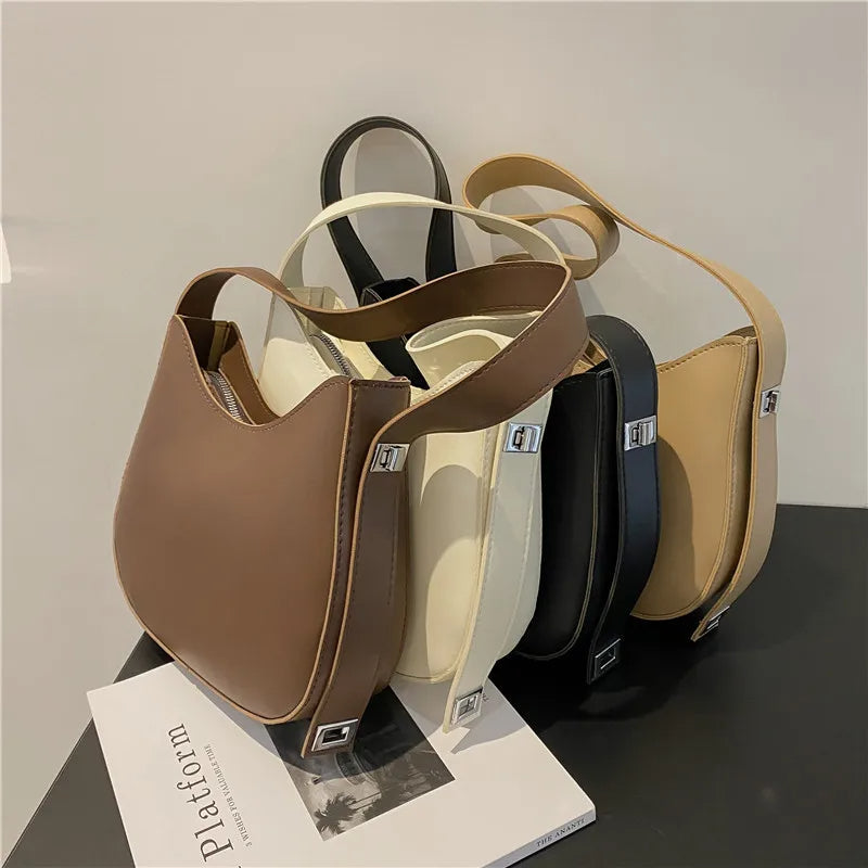 Damenhandtaschen aus Leder in Braun, Weiß, Schwarz und Beige, stilvoll und modern.
