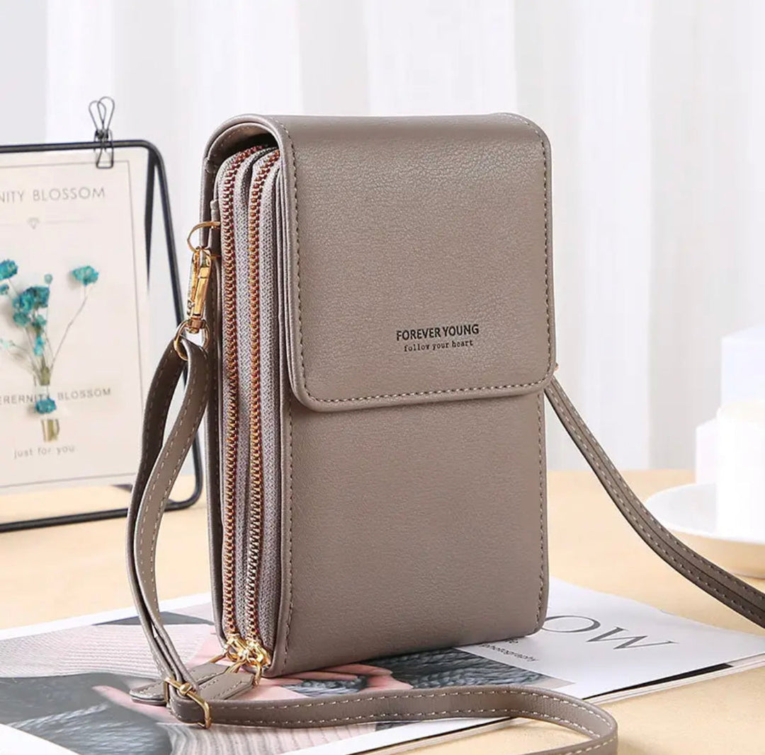 Graue Lederhandytasche mit Reißverschluss und Schulterriemen, modisch und praktisch.