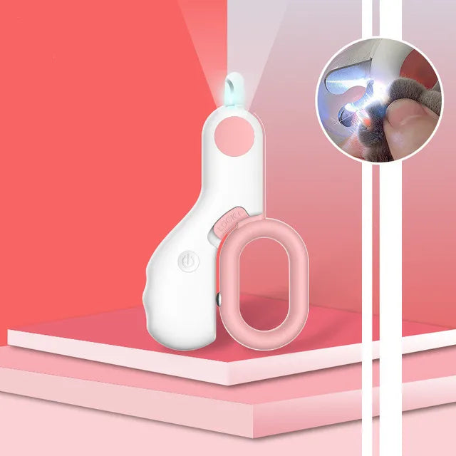 Weiße LED-Haustier-Nagelknipser mit rosa Griff, ideal für kleine Hunde und Katzenpflege.