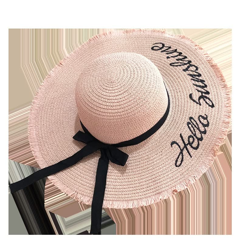 Rosa Damen-Sonnenhut mit schwarzer Schleife und Schriftzug, Sommermode Accessoire.