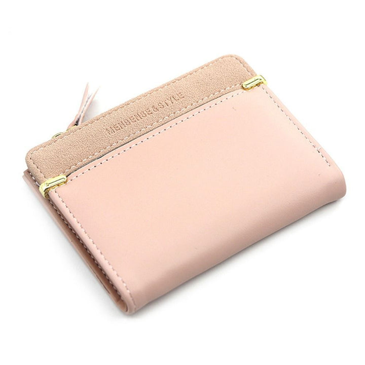 Damen Geldbörse Leder rosa, kompakt, elegant, mit goldenen Details, stilvoll und praktisch.