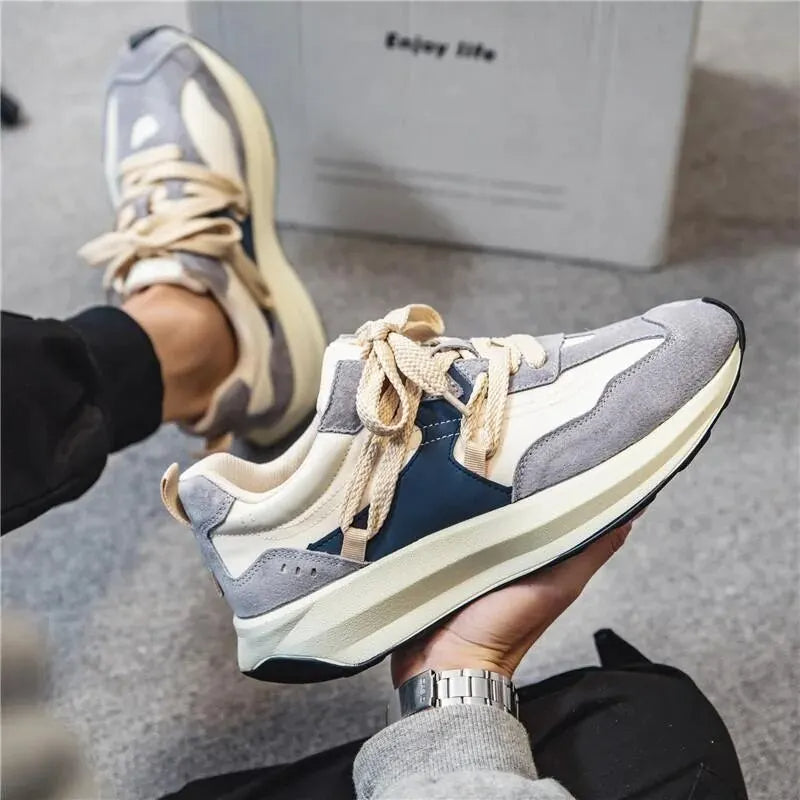 Grauer Sneaker Herren, Casual-Stil, elastisch, Leder, bequeme Freizeitschuhe, modisch.