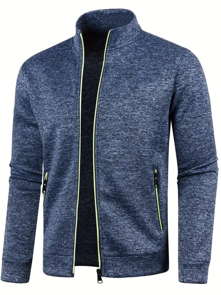 Dunkelblaue Herren-Sportjacke mit Reißverschluss, Stehkragen, Taschen, atmungsaktivem Material.