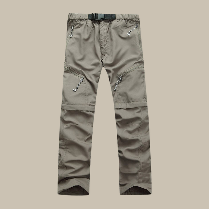 Graue Outdoor-Cargohose mit Reißverschlusstaschen, verstellbarem Gürtel, strapazierfähiges Material.