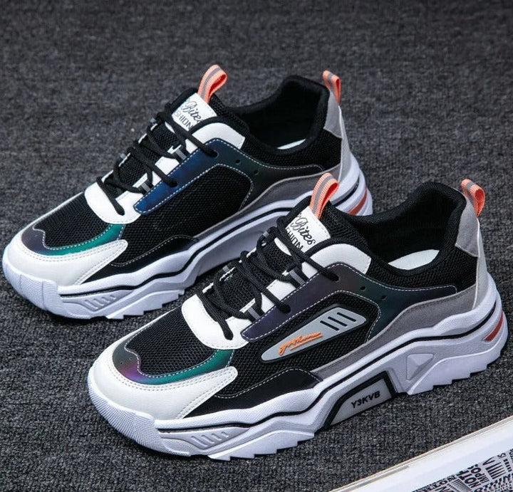 Modische schwarze und weiße Sneaker, atmungsaktiv, sportlich, Herren, bequem, Straßenstil.